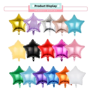 Array of star shaped foil balloons in various metallic colors for party decorations