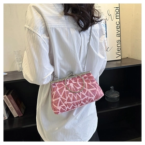 Pink geometric sequin evening bag featuring metal ring handle and fine silver chain strap