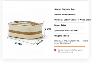 Detailed view of beige canvas makeup bag with cork trim, measuring 21.5x15.5x9.5cm
