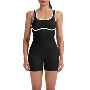 Seamless black fitness romper with white piping and ribbed stretch fabric for yoga