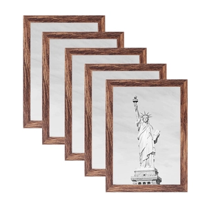 Set of five dark wood grain photo frames arranged in a modern tiered side view layout