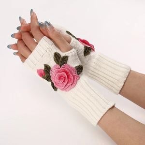Detailed view of ivory knit fingerless glove with pink rose 3D floral embroidery