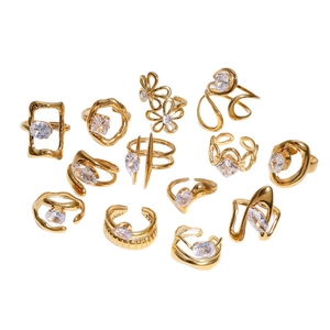 Set of 13 gold 18k plated titanium steel rings with cubic zirconia in various minimalist designs