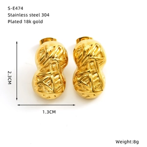 Detail view of peanut-shaped 18k gold plated stainless steel earrings with 2.3cm height