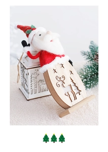 Detail of wooden Santa figurine with laser-cut reindeer and star patterns on white fur