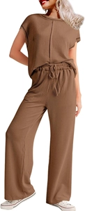 Detail of dark brown ribbed knit texture on stylish short sleeve top and wide leg pants