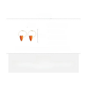 Detail specifications of golden hoop earrings with amber acrylic heart pendants