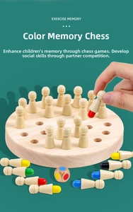 Close-up of wooden memory chess game showing hand picking a colored piece on a round board
