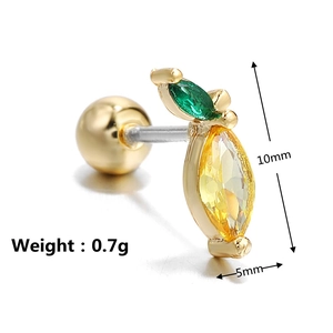 Macro shot of 10mm lemon fruit stud earring with yellow zircon and green leaf stone