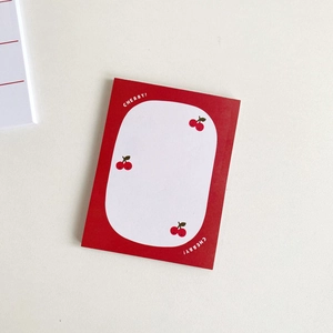 Close-up of cute cherry pattern sticky notes with red border and white writing space