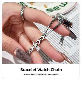 Detail of silver bangle strap with jewelry clasp on a quartz watch for women