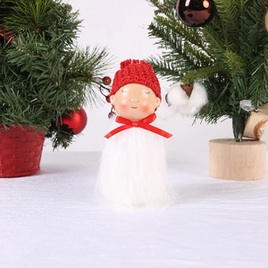 Detail of plush Christmas angel ornament featuring a red knit hat and soft faux fur beard