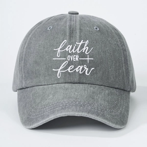 Vintage washed gray baseball cap featuring faith over fear embroidery and cross design