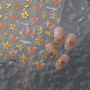 3D embossed gold butterfly nail stickers with metallic foil accents for DIY manicure