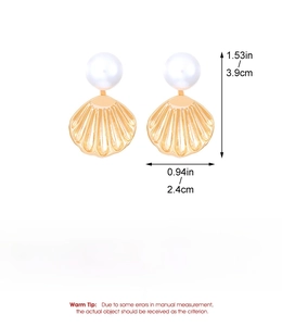 Detailed size view of gold shell earrings with white pearl, measuring 3.9cm by 2.4cm