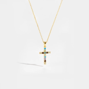 Close-up of S925 silver necklace featuring a gold cross pendant with multicolor zircons
