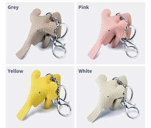 Creative genuine leather elephant keychains in grey, pink, yellow, and white colors