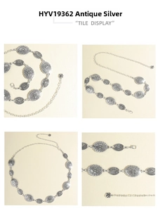 Detail view of vintage silver metal waist chain with embossed oval plates and rose pendant