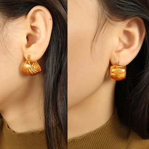 Vintage gold C-shaped earrings with shell texture and smooth square metal design