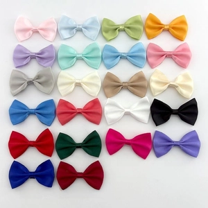 Detailed array of 22 colorful satin bow ties for DIY hair accessories and gift decor
