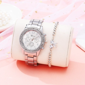Montre à quartz pour femme avec lunette en diamant et bracelet papillon sur coussin