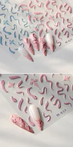 Macro view of M-837 nail art stickers with laser glitter snakes and crosses