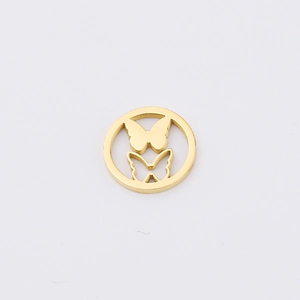 Detailed macro view of golden hollow butterfly circular pendant for DIY jewelry