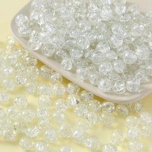 Macro shot of 10mm round cracked glass beads for DIY jewelry and necklaces
