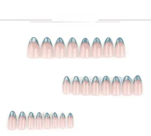 Macro detail of 24 almond press-on nails with nude base and blue glitter French tips
