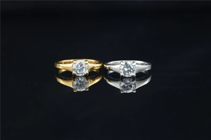Classic moissanite rings in gold and silver finishes with four-prong settings