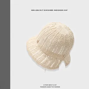 Breathable cream hollow knit bucket hat with stylish openwork pattern for women