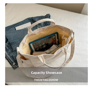 Interior view showing the large storage capacity of the corduroy tote bag for daily items