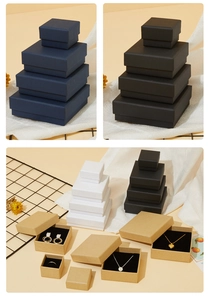 Detailed collection of cardboard jewelry gift boxes in navy, black, white and kraft