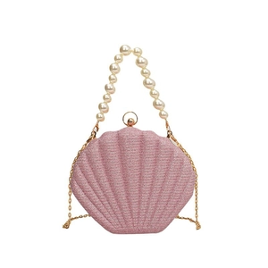 Pink shell-shaped evening bag with glitter texture, pearl handle and gold chain strap