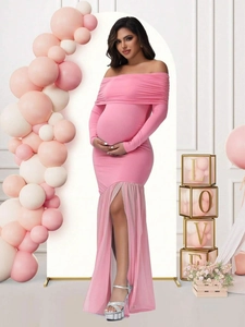 Pink off-shoulder maternity dress with long sleeves and mesh panels for photography
