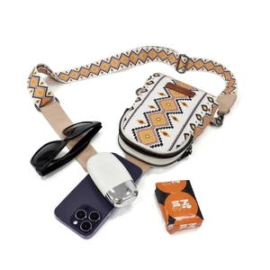 Bohemian canvas crossbody phone bag with geometric patterns and adjustable wide strap