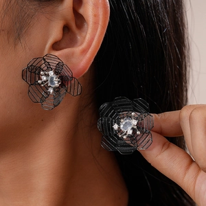 Vintage hollow mesh flower stud earrings with white rhinestones in dark bronze finish