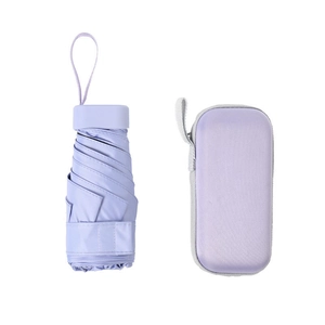 Mini lavender UV umbrella in a compact storage case with convenient carrying strap