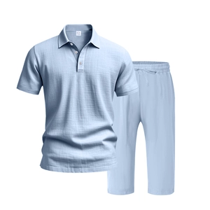 Detailed fabric texture of men's light blue breathable linen polo shirt and trousers set