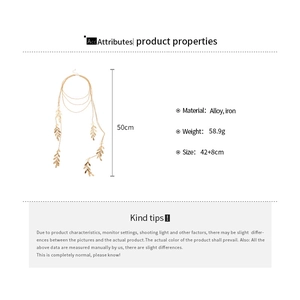 Detail view of gold multi-layer leaf tassel necklace with chain length and weight specs
