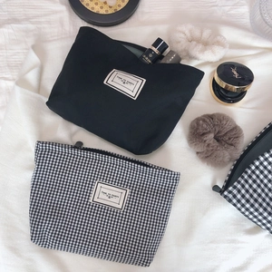 Minimalist black and houndstooth cotton makeup bags with Time To Party label and top zipper