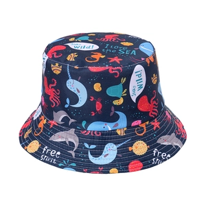 Reversible shark print bucket hat for sun protection with ocean life graphics