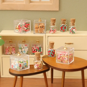 Miniature dollhouse Christmas candy jars and containers with gingerbread and candy canes