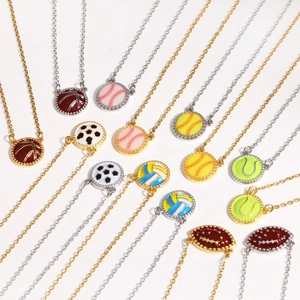 Detail of sports necklaces showing basketball, soccer, and football pendants in gold and silver