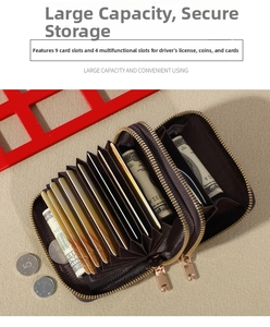 Detail of dark brown leather accordion wallet with 9 card slots and 2 gold zippers