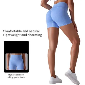 Seamless high-waisted yoga shorts in light blue marl fabric with peach lift effect