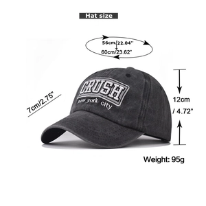 Detail view of washed cotton baseball cap with CRUSH embroidery and dimension markings
