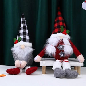 Detail of Christmas faceless gnome curtain tiebacks with plaid hats and plush fabric