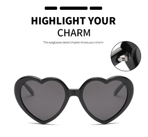 Detail shot of sturdy silver metal hinges on heart-shaped fashion sunglasses