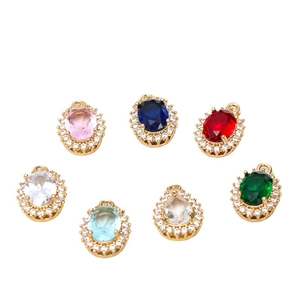 Oval crystal pendant with colorful zirconia and gold-plated copper rim in various colors